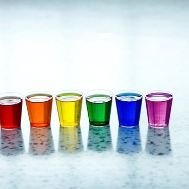 Cups of coloured liquid