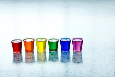 Cups of coloured liquid